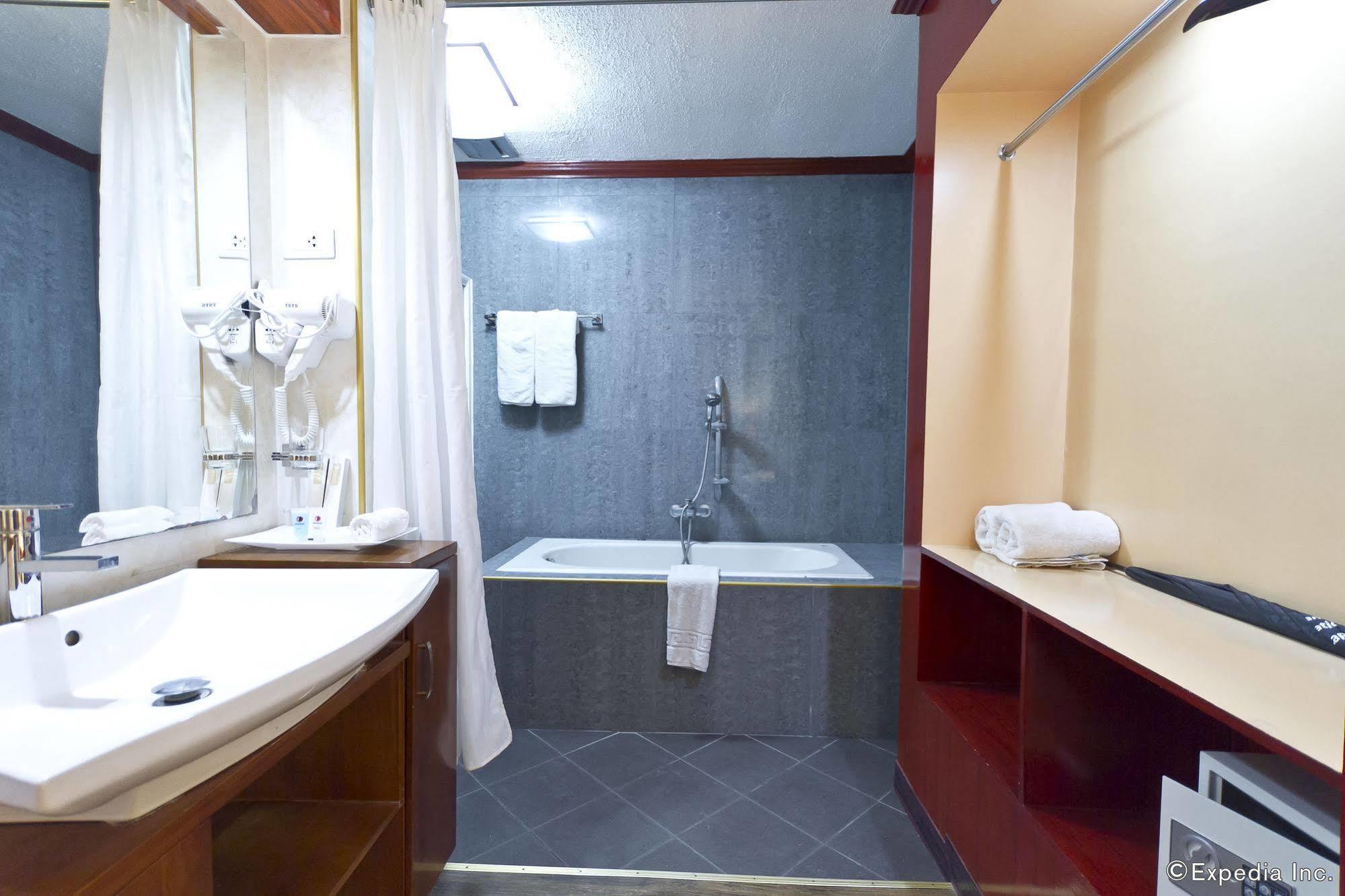 Dulcinea Hotel And Suites Мактан Екстериор снимка
